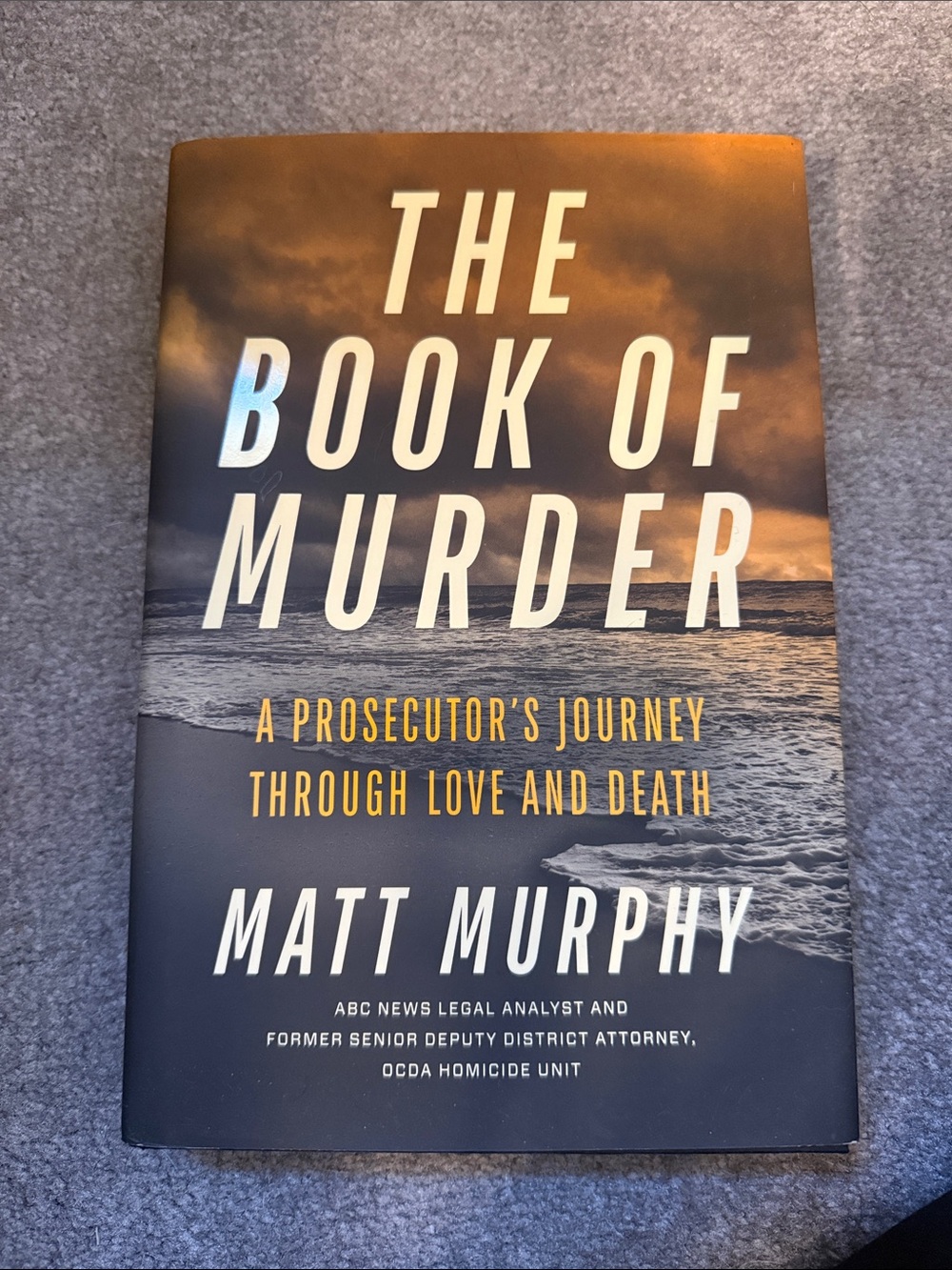 The Book of Murder by Matt Murphy - Sunset Orange & Navy Hardcover